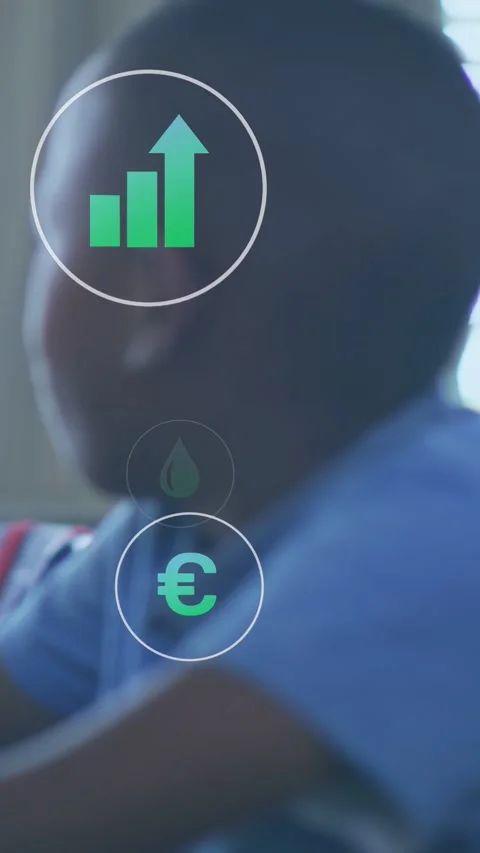 Vertical video: Boy sitting on start green chart and euro icons animating over Stock Footage 332734822