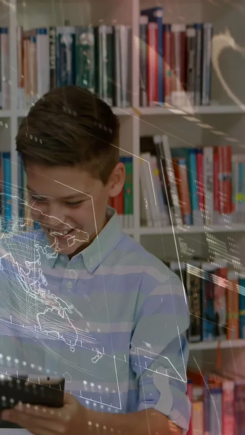 Vertical video: Boy student tapping tablet, causing animated world map overlay Stock Footage 331270979