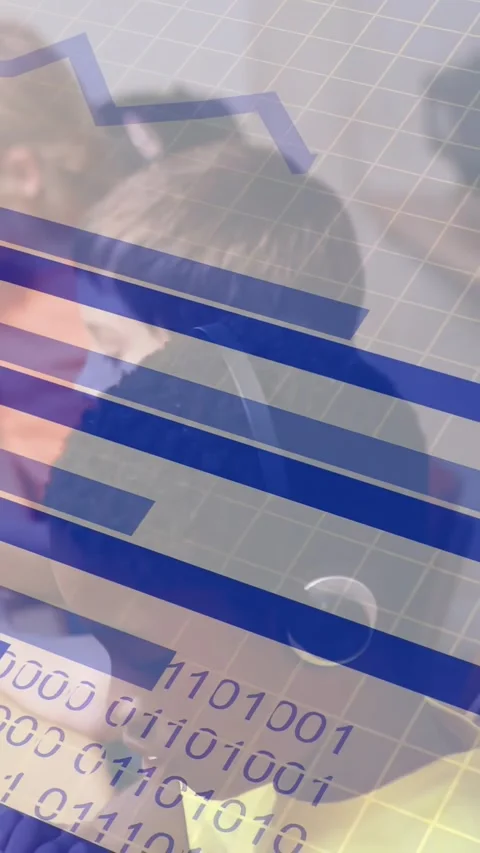 Vertical video: Boy tapping tablet, sparking blue bars then binary overlay Stock Footage 331077233