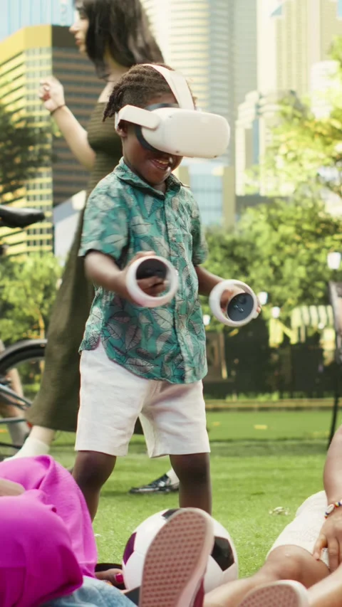 Vertical Video Boy wearing virtual reality headset and holding motion Stock Footage 341470998