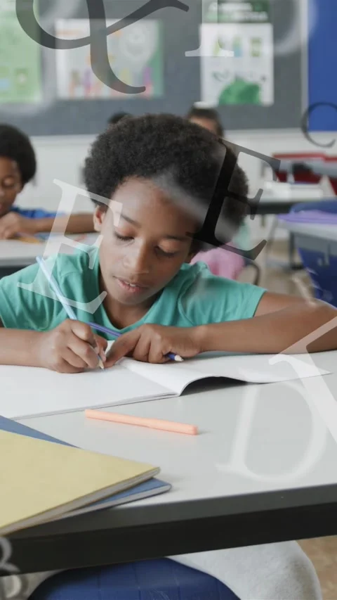 Vertical video: Boy writing in class, pencil touching paper and animating Stock Footage 335507608