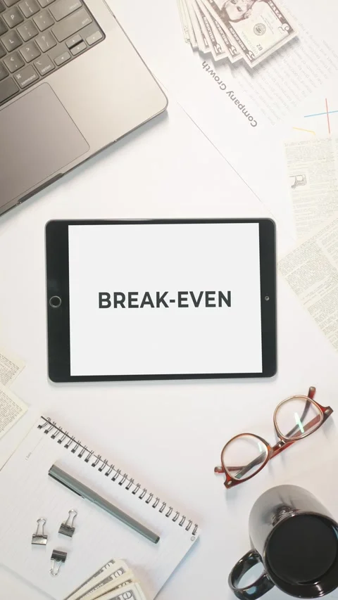 VERTICAL VIDEO OF BREAK-EVEN DISPLAYING ON A TABLET SCREEN Stock Footage 308077095