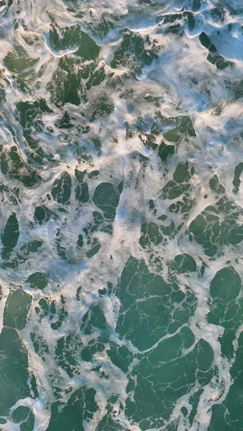 Vertical Video: Breathtaking Slow-Motion Drone Flight over a Stormy Sea - Azure Stock Footage 244240443