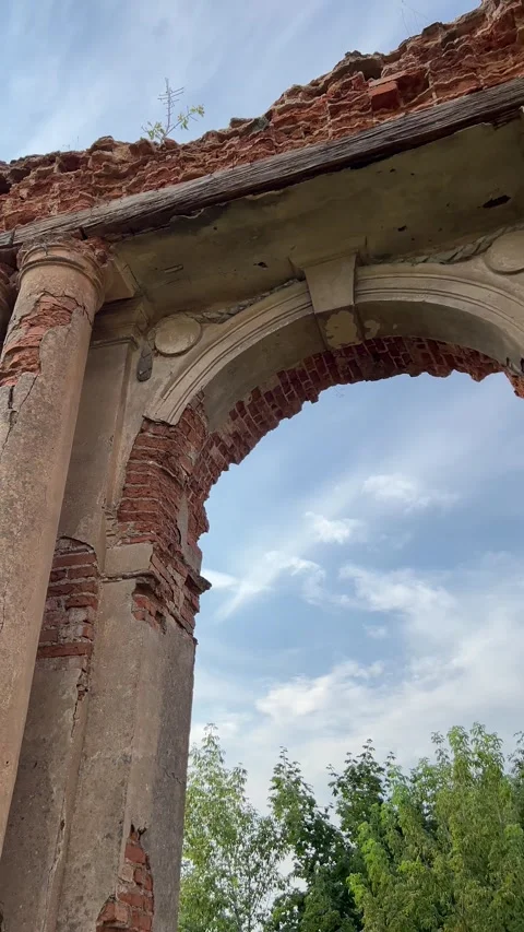 Vertical video of a brick arch from an old ruined castle Stock Footage 308929542