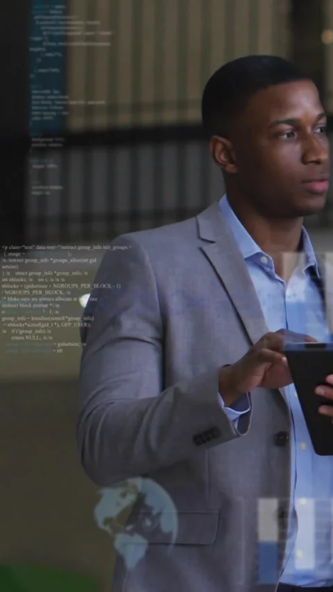 Vertical video: Business analyst tapping tablet in lobby creating 3D globe and Stock Footage 333835710