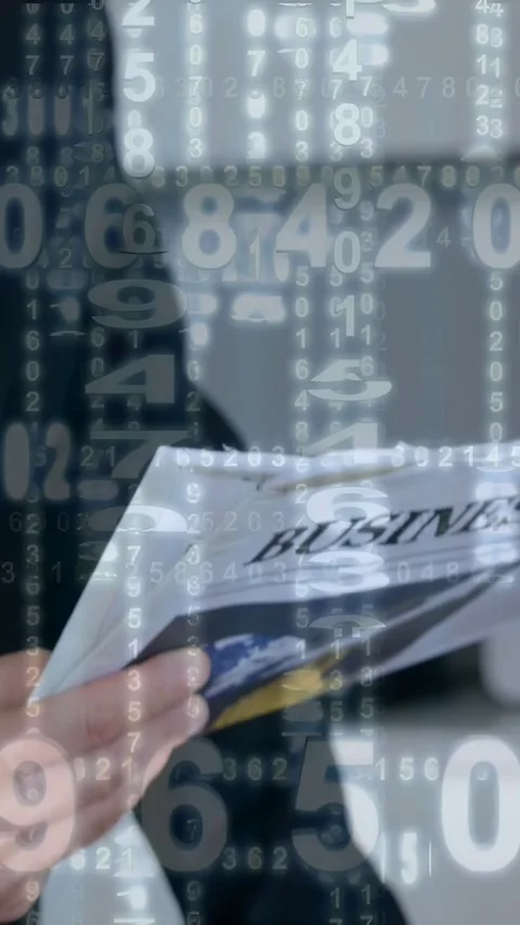 Vertical video: Business manager using card on brochure, numeric overlay showing Stock-Footage 334917109