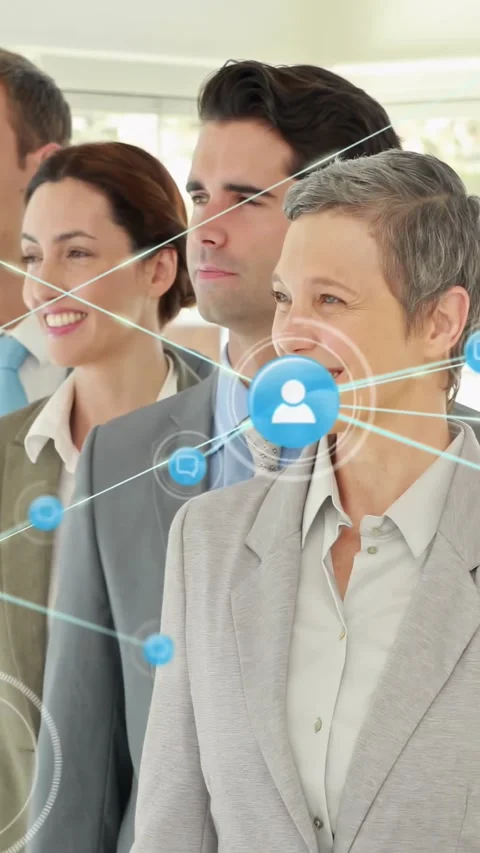 Vertical video: Business team posing, blue node appearing and expanding over 스톡 동영상 334318835
