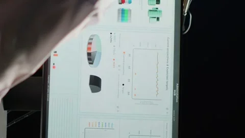 Vertical video Businessman comparing analytics data Stock Footage 254403707