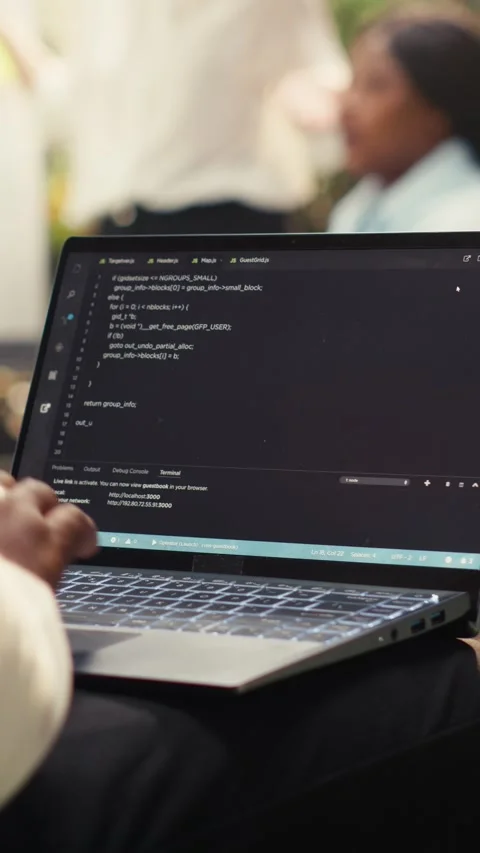 Vertical Video Businessman programmer using binary code on laptop during Stock Footage 339070148