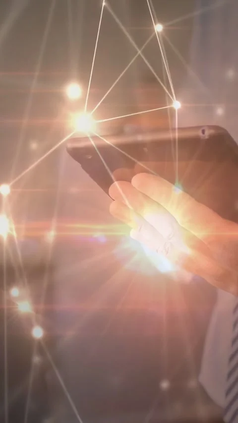 Vertical video: Businessman tapping device, creating node web tracking finger Stock Footage 334317417