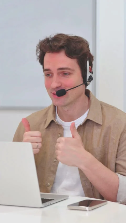Vertical Video, Call Center Agent Speaking Online with Customer Stock Footage 318048683