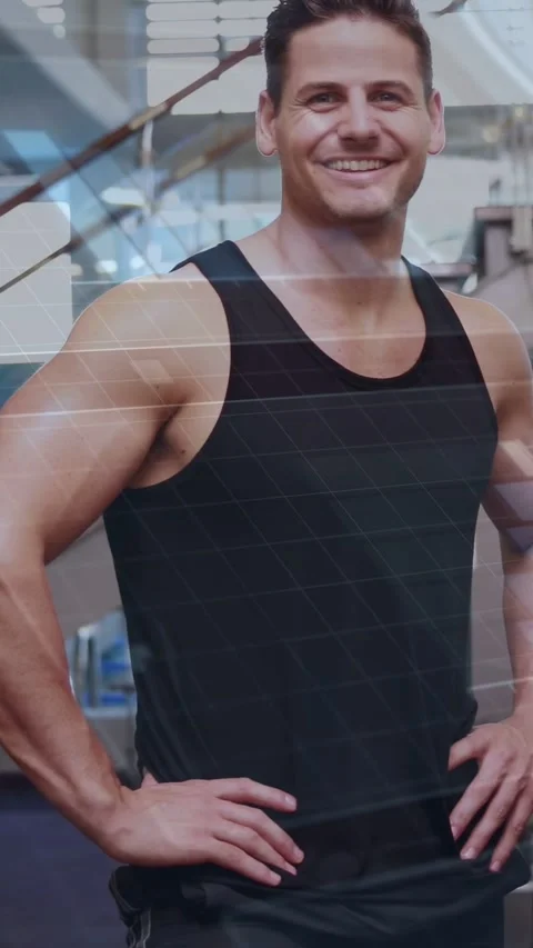 Vertical video: Cam panning, man posing forming fitness portrait, woman joining, Video stock 333595933