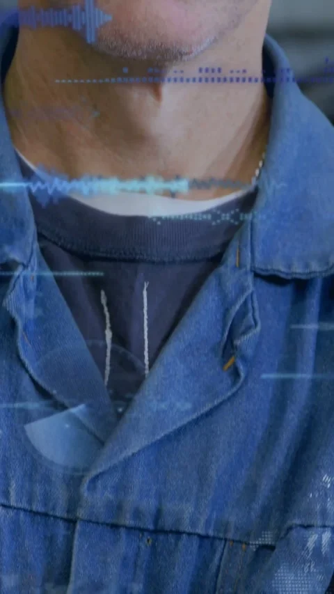 Vertical video: Cam panning up as tech filling frame wave overlay across face Stock Footage 334319238