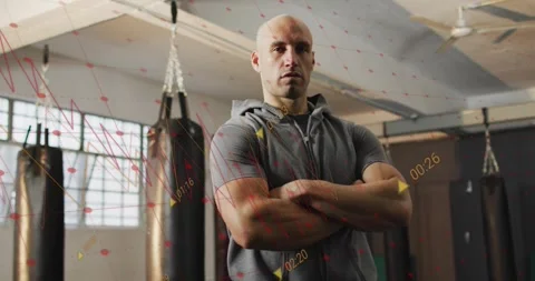 Vertical video: Cam pulling back, man folding arms, turning head at gym bags, Vídeos de archivo 330508979