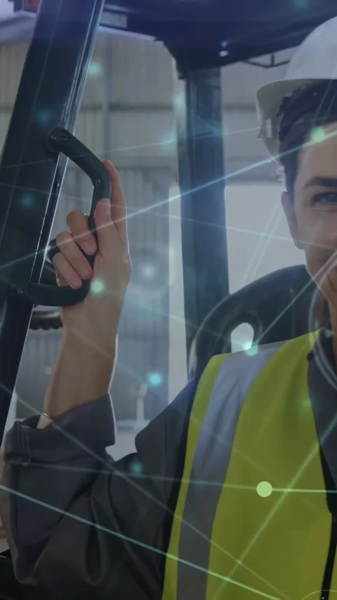 Vertical video: Cam pulling back, operator holding assist handle, preparing Vidéo 334387209