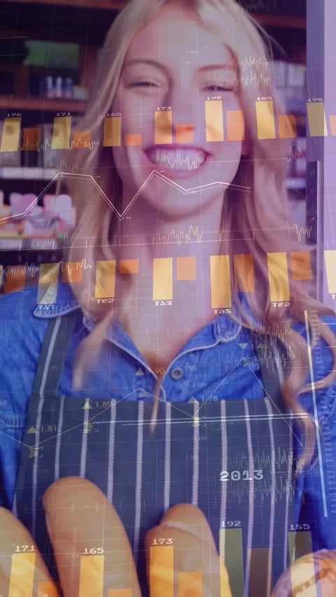 Vertical video: Cam pulling back revealing bakery staff while chart overlay Stock Footage 340133193