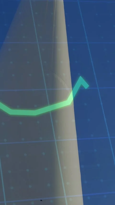 Vertical video: Cam tilting down wind turbine blades turning green graph moving Stock Footage 333542164