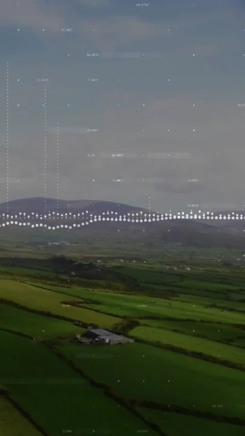 Vertical video: Camera descending showing barn fields, waveform and bars pulsing Stock Footage 332317723