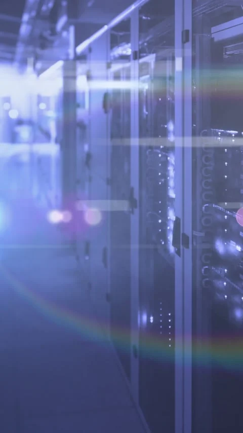 Vertical video: Camera dollying forward, glass racks flashing LEDs, flares Video stock 348495218