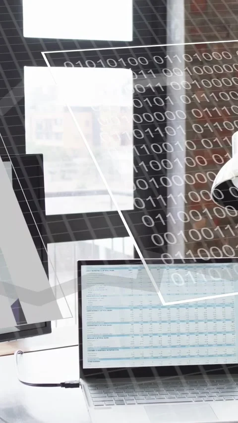 Vertical video: Camera framing laptop causing overlays, numbers scrolling, bar Stock Footage 335264171