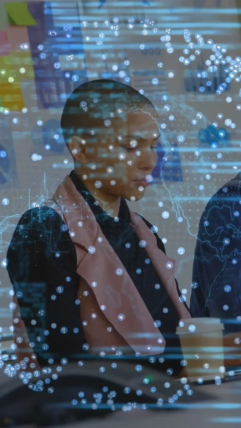 Vertical video: Camera framing team showing map and code over laptops woman Stock Footage 333304093