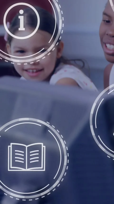 Vertical video: Camera pan showing two girls pointing at monitor in class, HUD Stock Footage 329875485