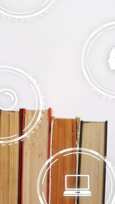 Vertical video: Camera panning book spines centering view while icons pulse over Video stock 330982743