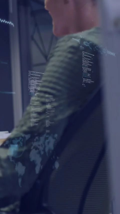Vertical video: Camera panning female tech designer analyzing model while AR Stock Footage 333036811