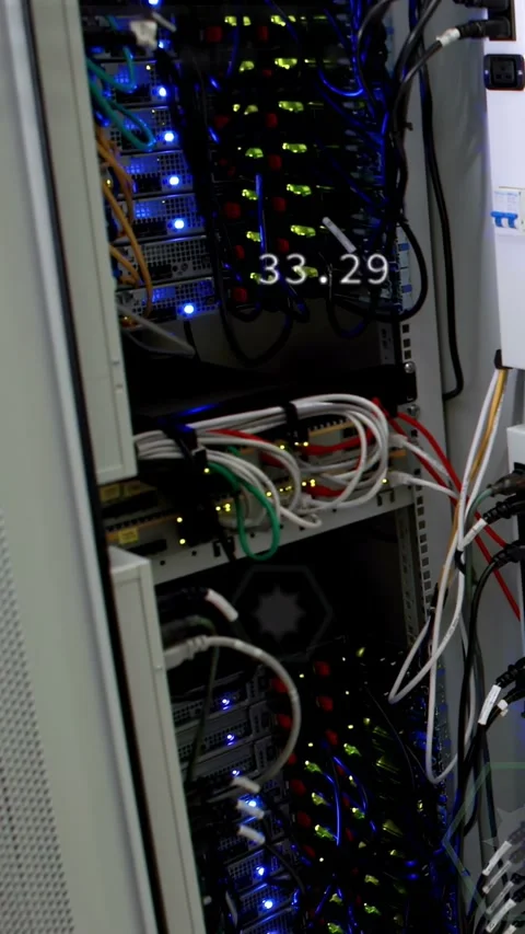 Vertical video: Camera panning rack, hex overlays tracking LEDs, updating values Stock Footage 332823309