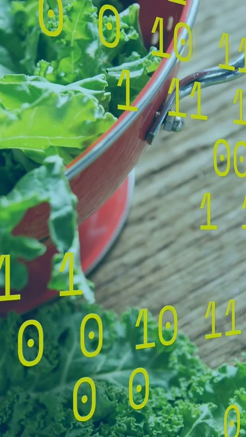 Vertical video: Camera panning right showing kale in red sieve as yellow bits Stock Footage 334792612