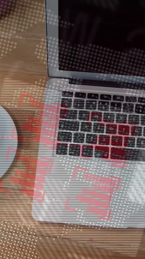 Vertical video: Camera panning right, laptop keys moving closer, overlay marking Stock Footage 334792731