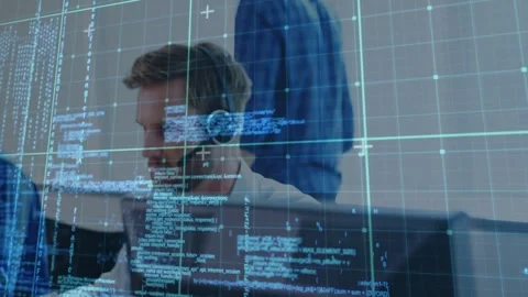 Vertical video: Camera panning showing support reps on calls, agent typing and Stock Footage 332544653