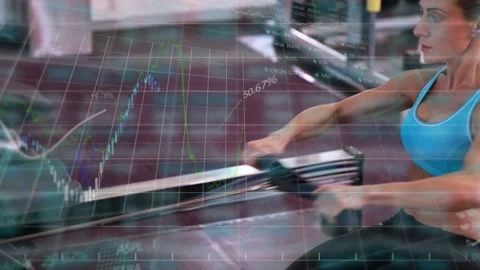 Vertical video: Camera pulling back showing woman rowing erg at gym, bra chart Stock Footage 332685904