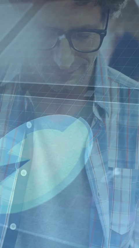 Vertical video: Camera pulling up revealing developer typing and reading code Stock Footage 332594932