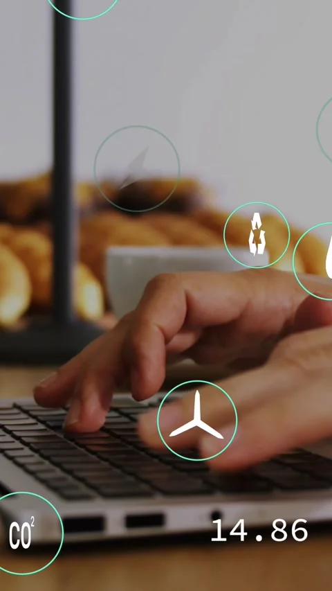 Vertical video: Camera shifting causing hands typing laptop keys, icons floating Stock Footage 329934208