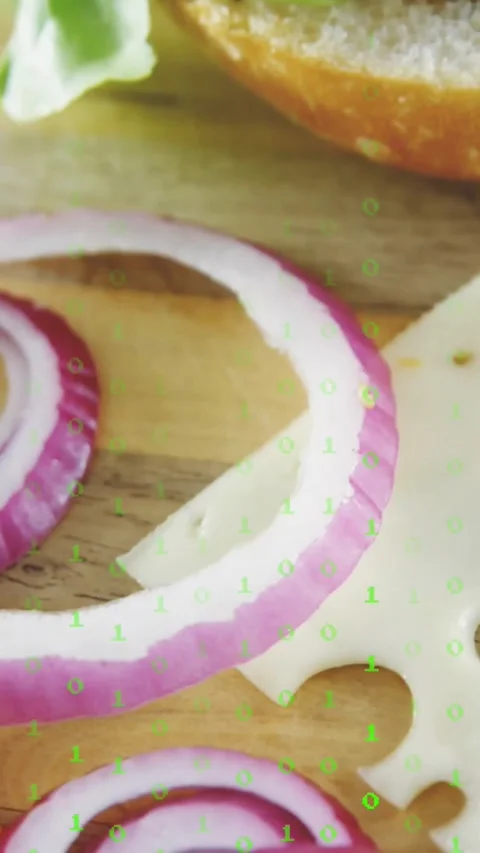 Vertical video: Camera shifting down causing binary overlay clearing, burger Stock Footage 332278242