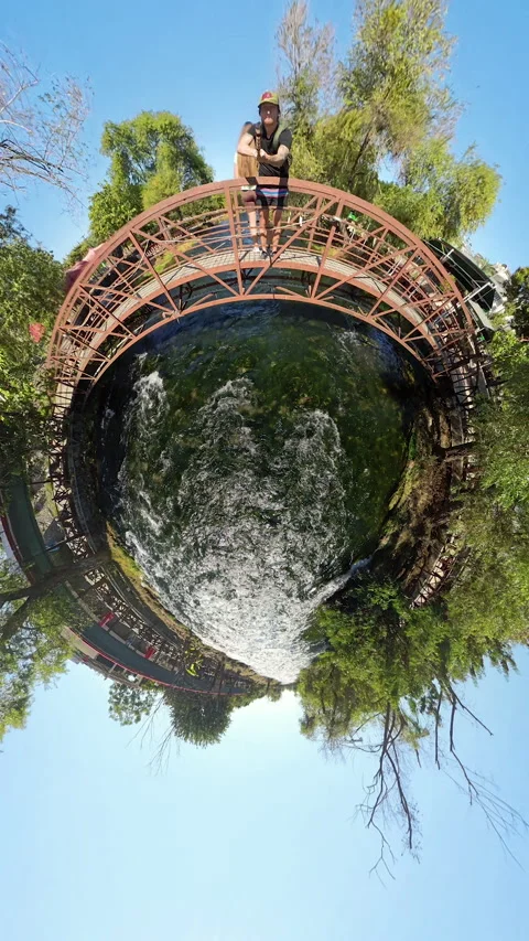 Vertical video. The camera transitions from a Tiny Planet effect to a wide-angle Video stock 289795053