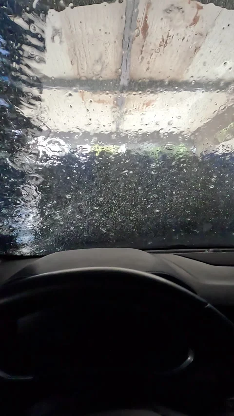 Vertical video of a car wash from the inside Видео 332065280