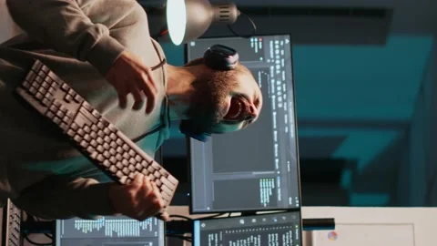 Vertical video: Careless html coder playing air guitar with keyboard Stock Footage 221655161