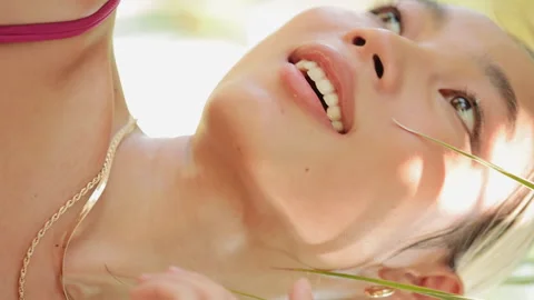 Vertical Video. Charming Young Asian Fashion Model Posing Outside, Wearing Stock Footage 258317142