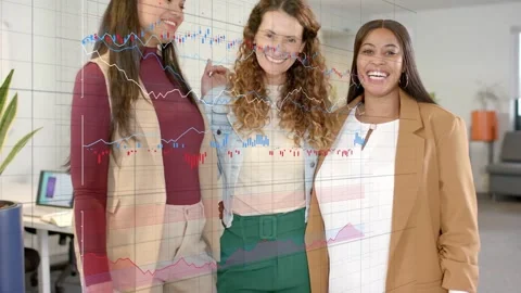 Vertical video: Charts fading, three women closing in at office table in work Stock Footage 332315422