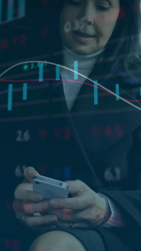 Vertical video: Checking smartphone after market alert, woman in car wearing Stock Footage 334602487