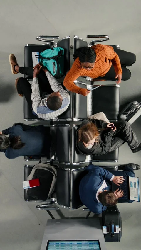 Vertical video Checking visa documents, talking and people in airport hub, top Video stock 334850408