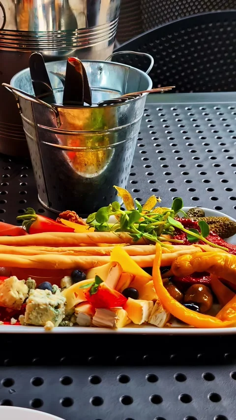 Vertical Video - Cheese Platter with Wine on Outdoor Table Stock Footage 337929269