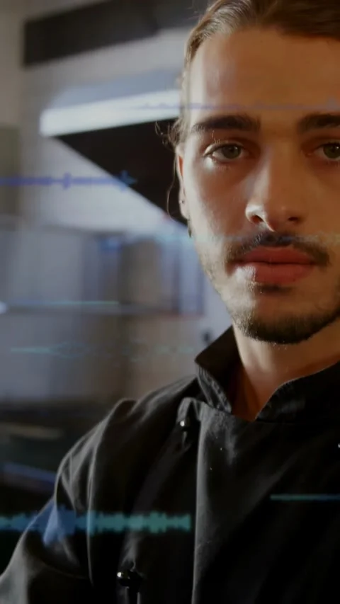 Vertical video: Chef relaxing arms as camera moving up and in, HUD revealing Stock Footage 332734570