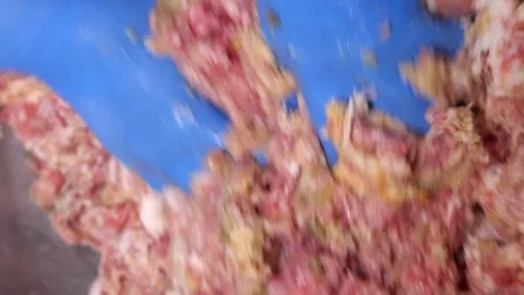 Vertical video. The chef's hands mix pork, bread, minced meat, lard and egg to Video stock 248906543