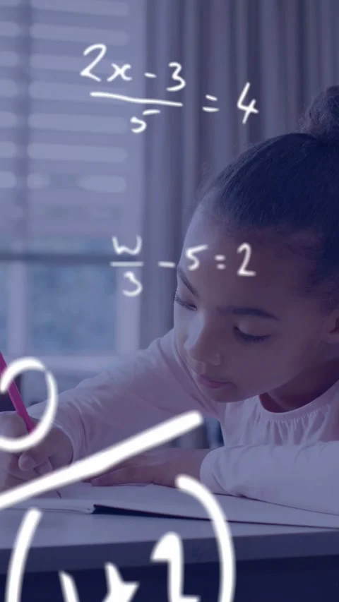 Vertical video: Child student doing homework sparking floating math equations Stock Footage 334694797