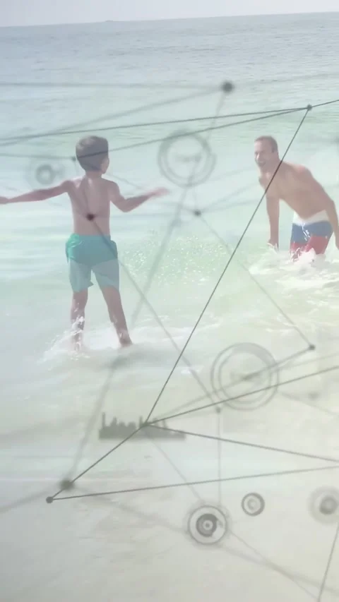 Vertical video: Child in teal trunks running into surf, dad in red-blue trunks Stock Footage 334385970