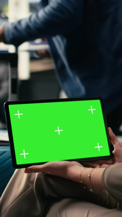 Vertical Video Chroma key mockup on tablet with group of people waiting in Stock Footage 333613522