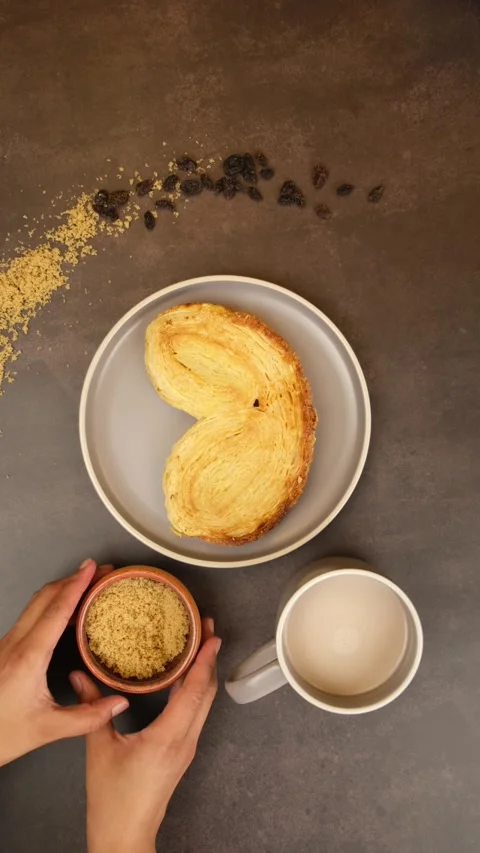 Vertical video Cinnamon rolls with raisins and muscovado sugar Stock Footage 279354877